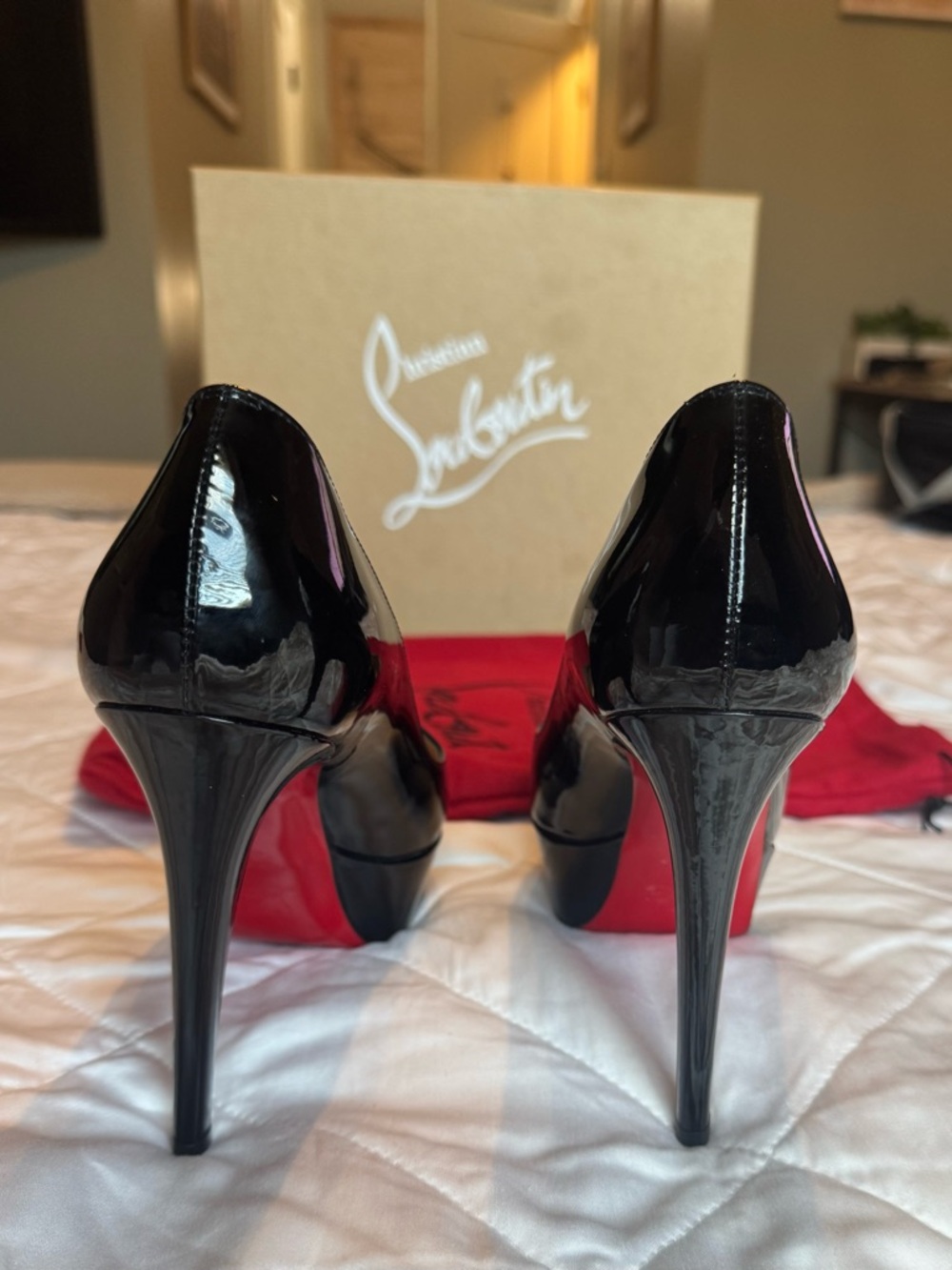 Christian Louboutin Black Patent Pumps with Red Soles